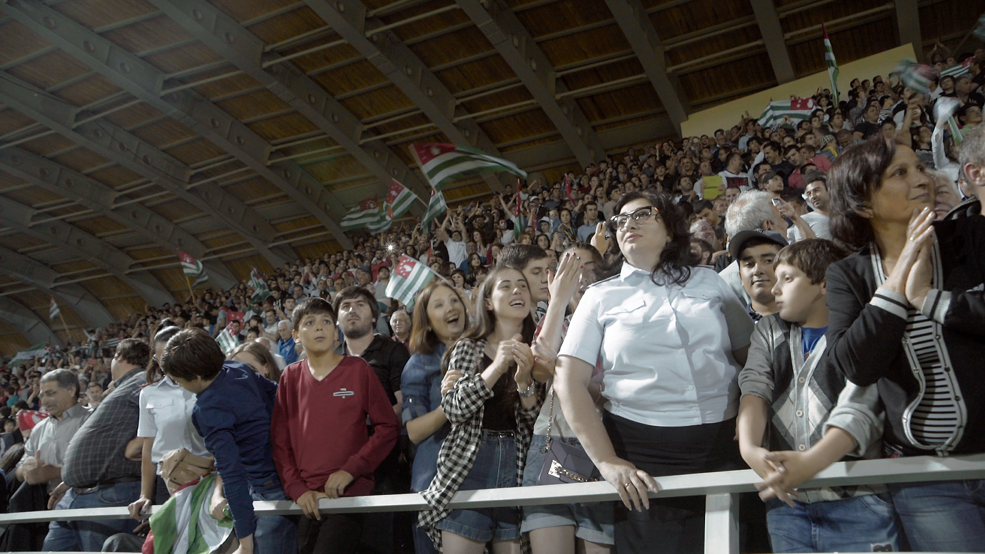 Abkhazian police member witnesses the last moments of the final match during the Abkhazia-Panjab Conifa World Cup Event (june 2016)